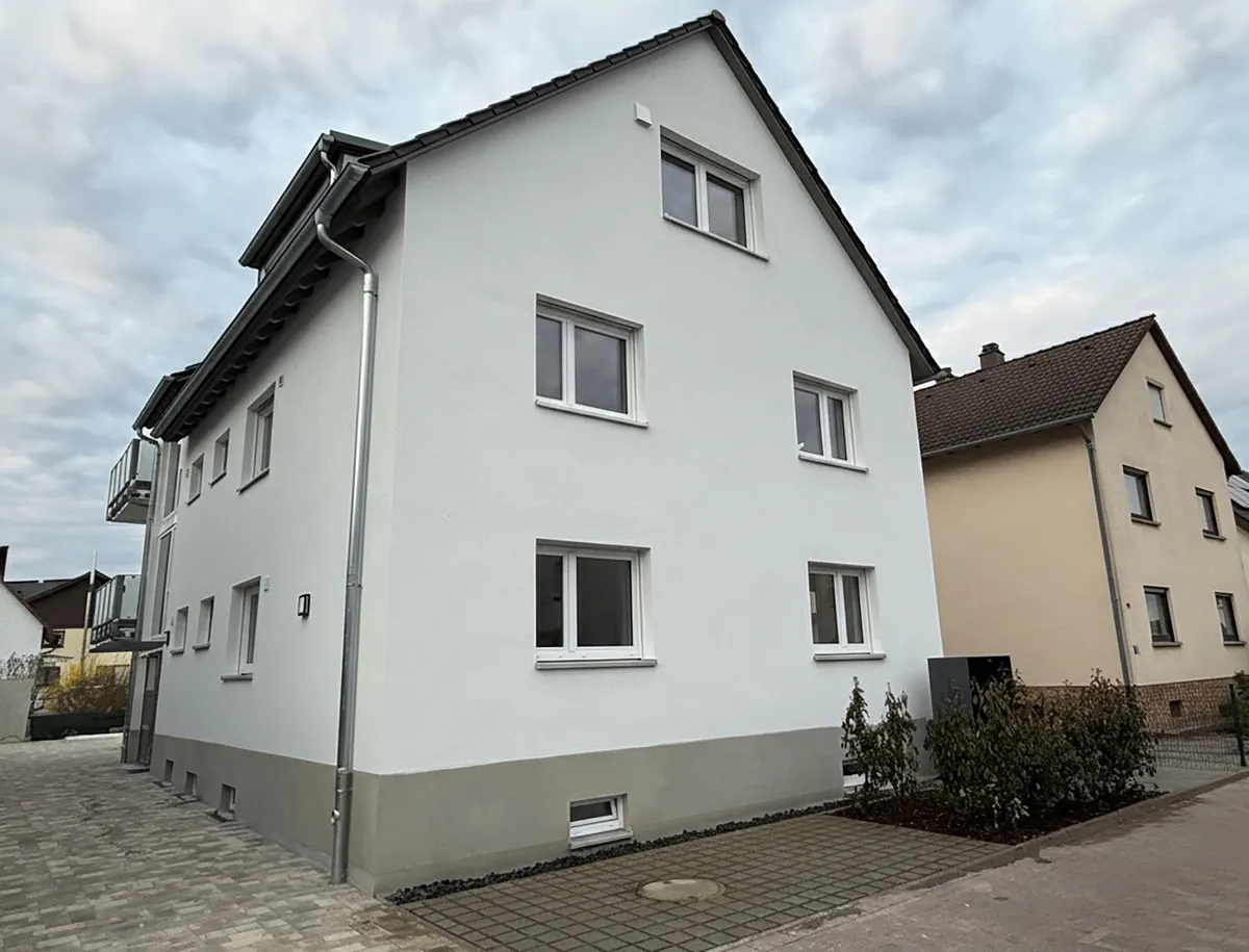 Umbau + Erweiterung 3-Familienhaus