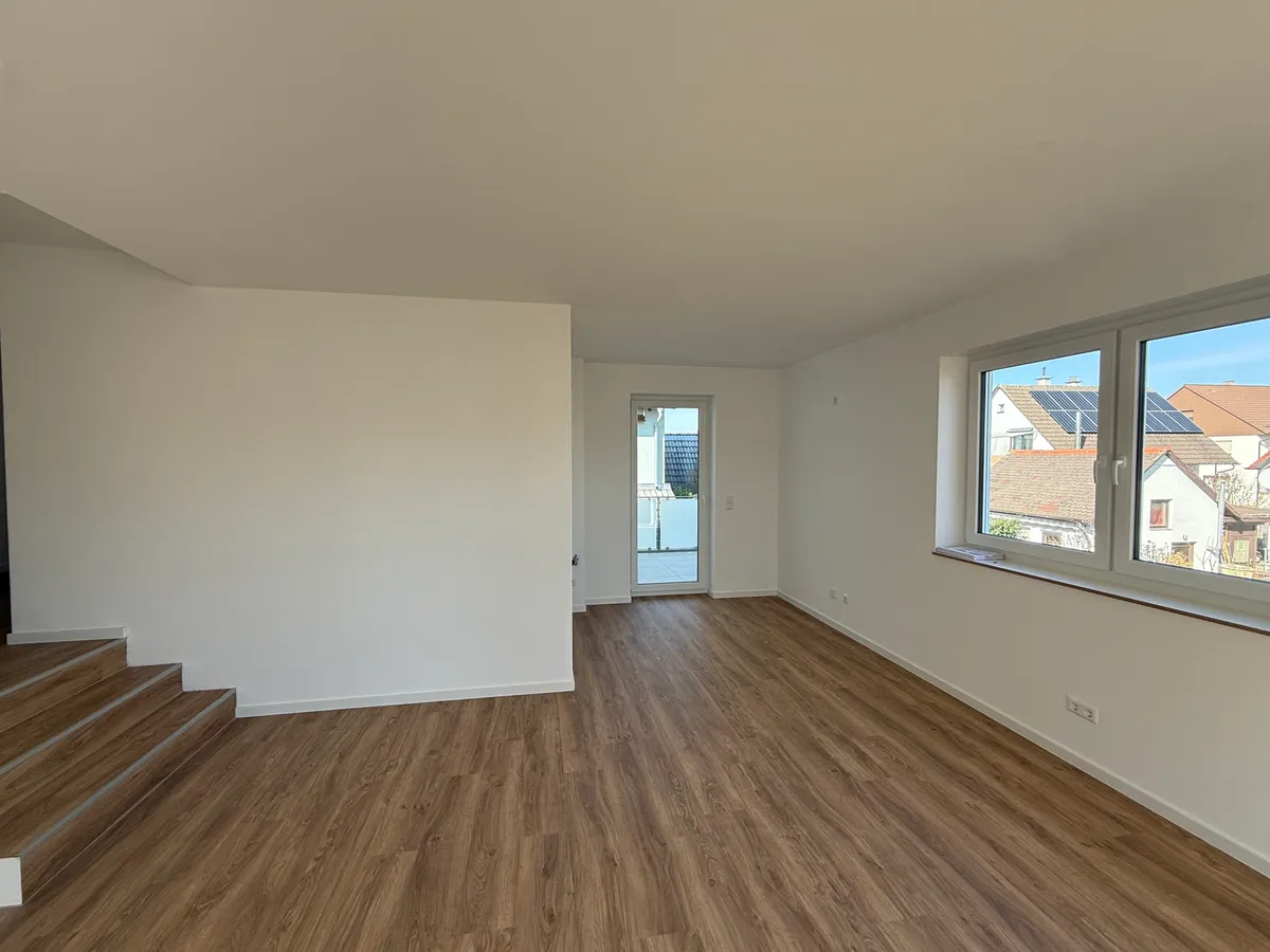 Umbau + Erweiterung 3-Familienhaus