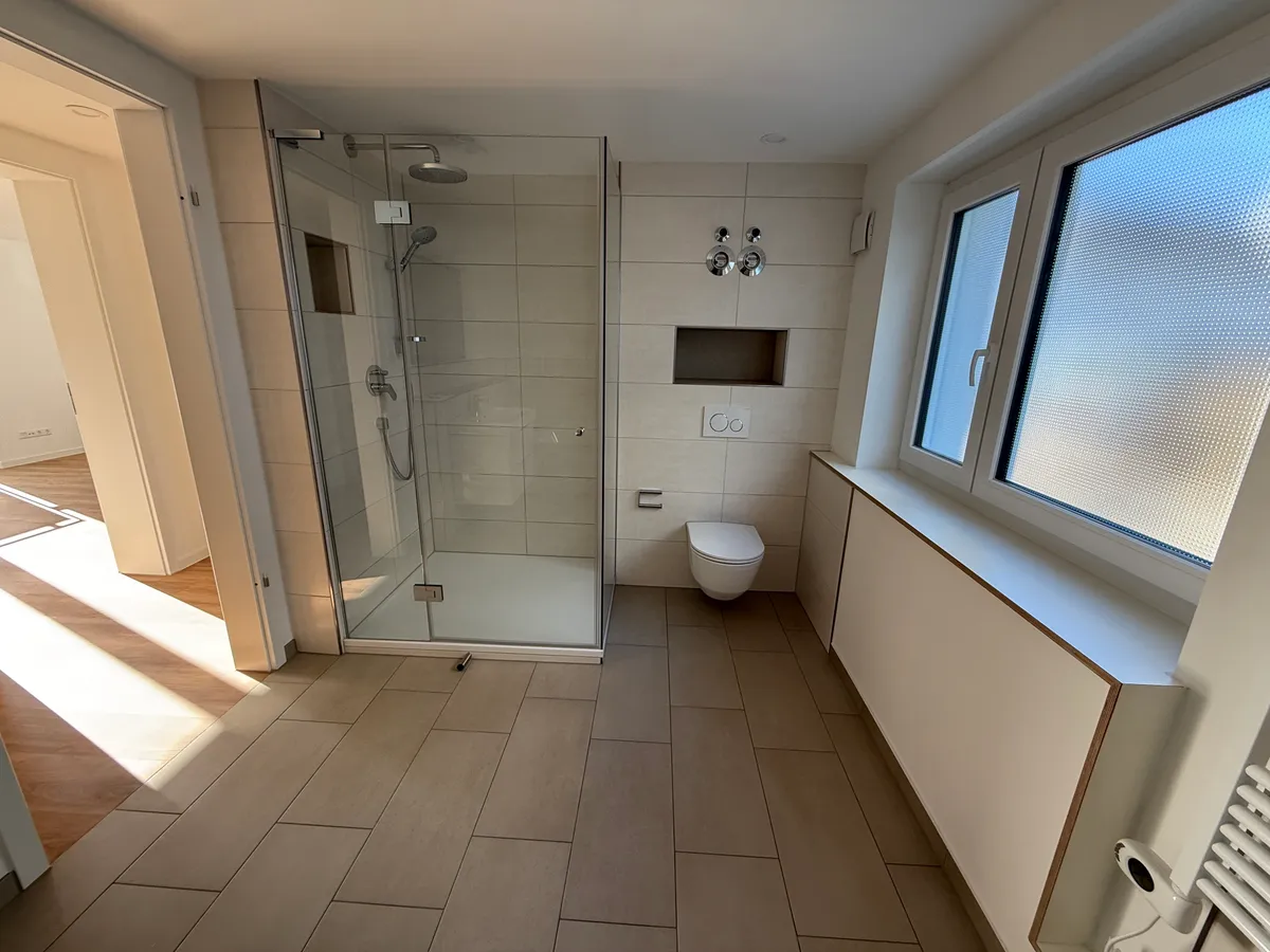 Umbau + Erweiterung 3-Familienhaus