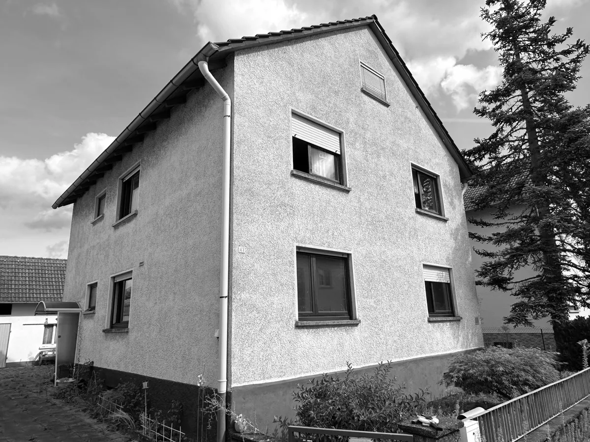 Umbau + Erweiterung 3-Familienhaus